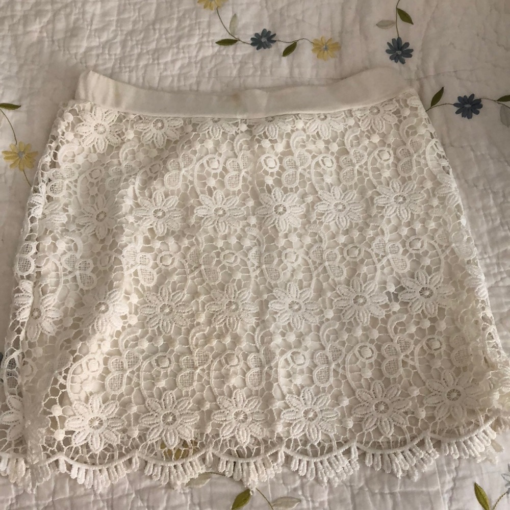 White crochet mini skirt.